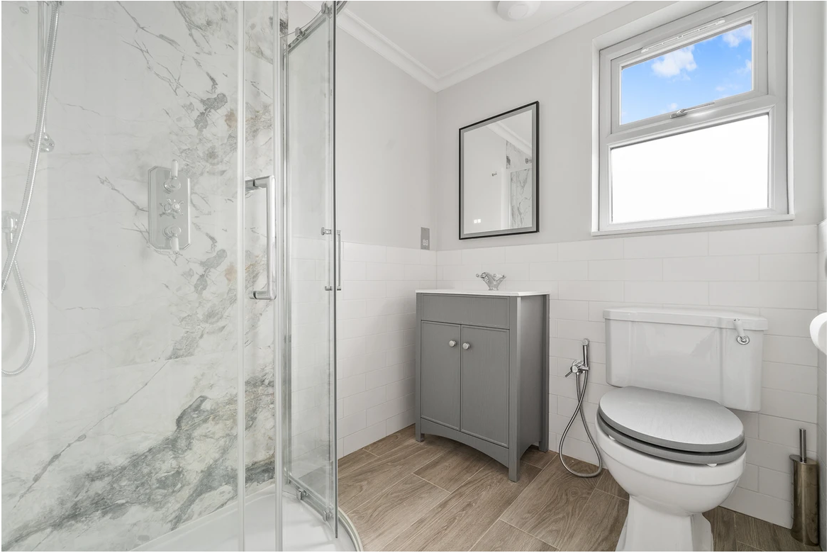 Authentic Dezign Studio photograph from the completed Leytonstone Loft Shower project.